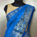 Graceful Ananda Colour Tussar Saree Adorned with Traditional Buttis