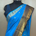 Designer Sky Blue Crepe Saree with Contrasting Navy Blue Skirt Border